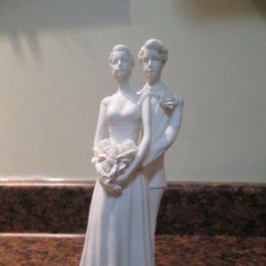 White porcelain bride and groom figurine